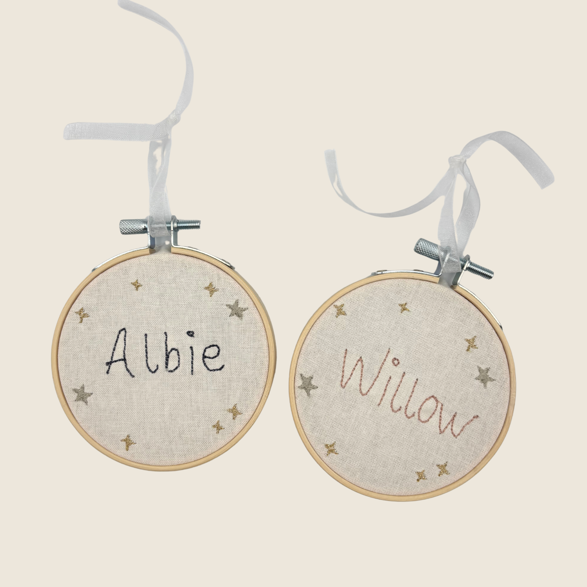 Small embroidery hoop with stitched name